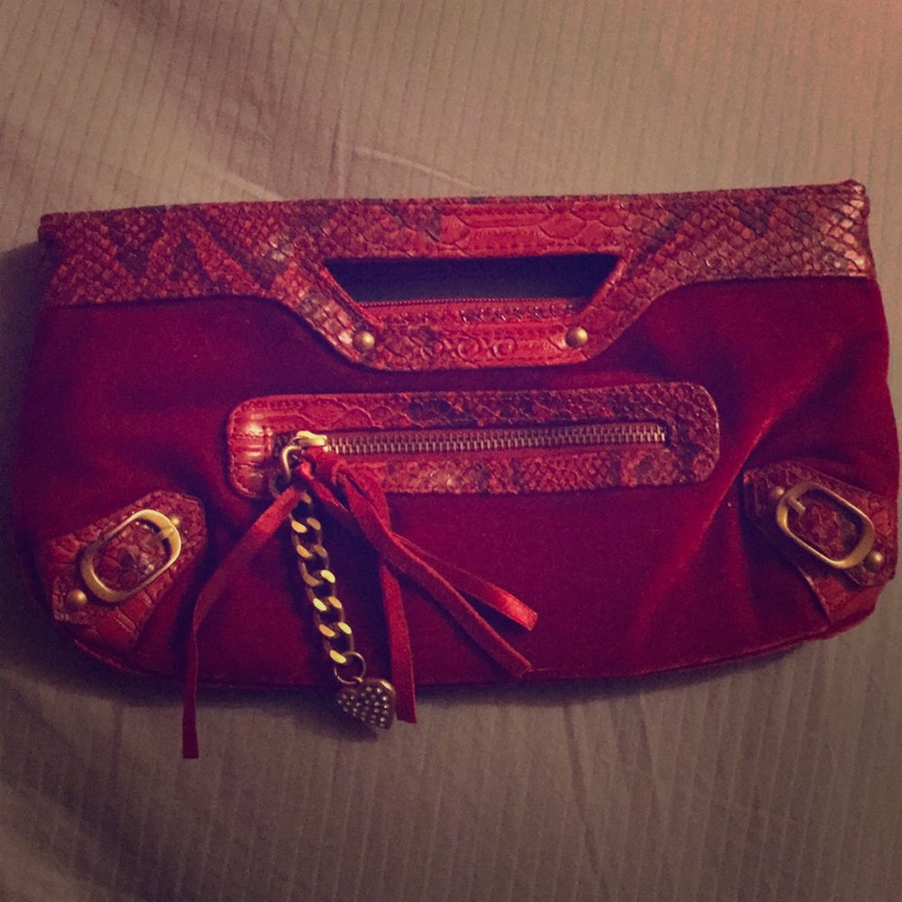 Red velvet clutch with snakeskin print trim